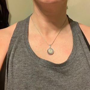 Interchangeable pendant piece necklace.